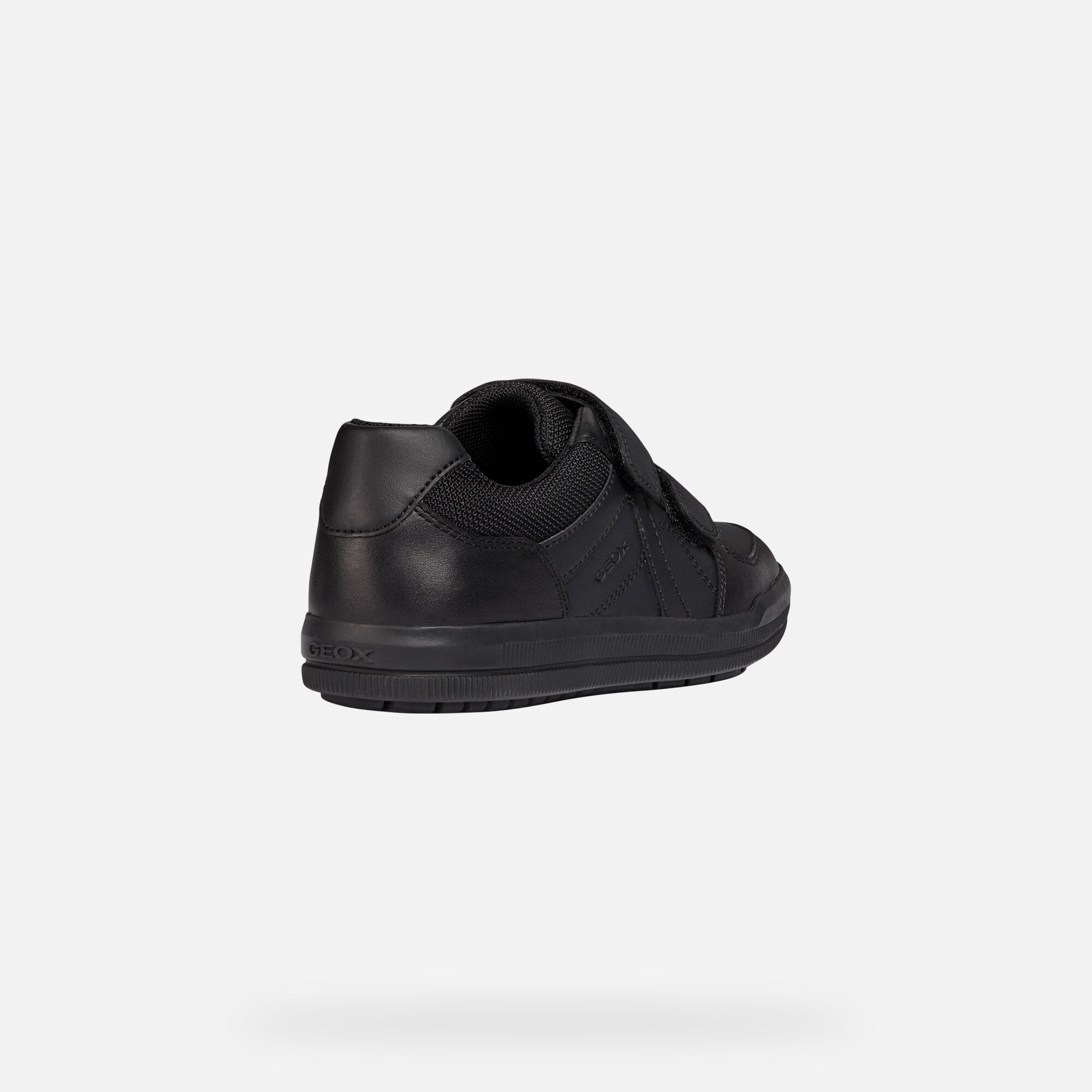 black uniform sneakers
